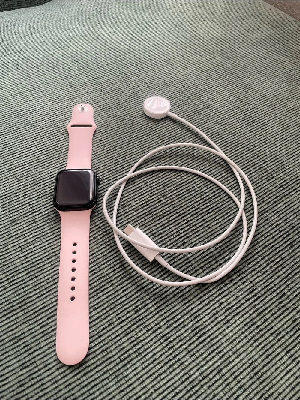Apple Smartwatch with Light Pink Sport Band and White Charger